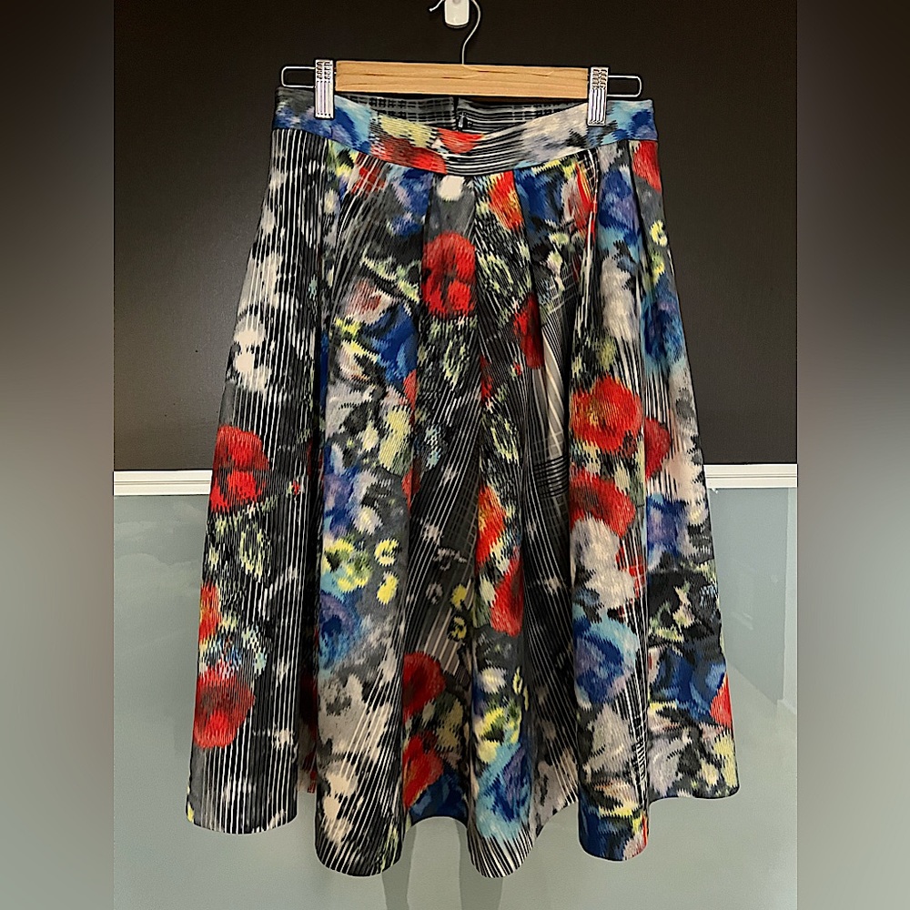 It has pockets! Fun A line mid skirt